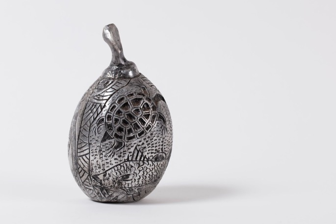 Aluminium sculpture of a boab nut