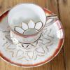 Moustache lidded tea cup and saucer