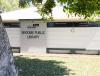 Photo of a building with the sign saying Broome Public Library