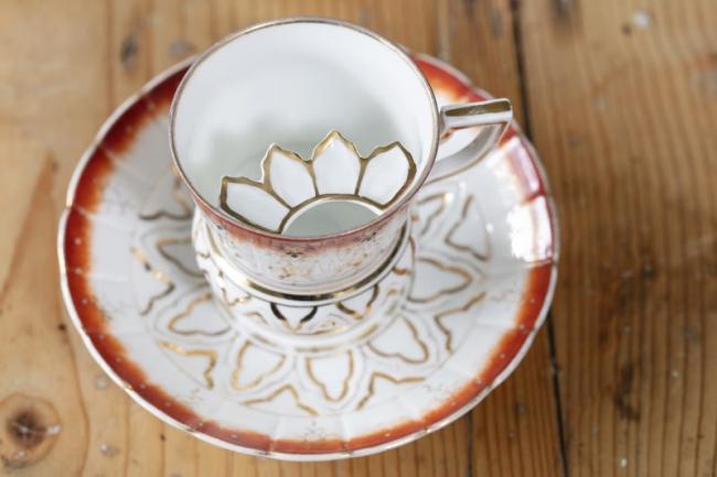 Moustache lidded tea cup and saucer