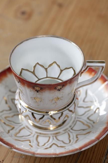 Moustache lidded tea cup and saucer