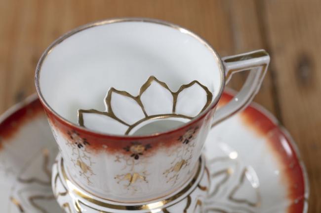 Moustache lidded tea cup and saucer