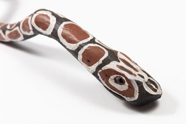 Giant camouflaged snake